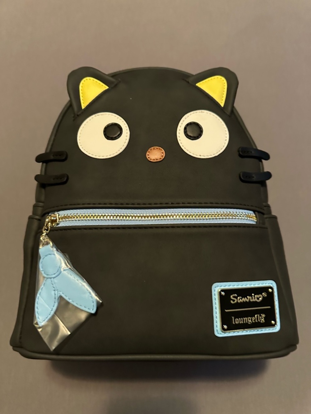 Loungefly Black Cat Mini Backpack with Yellow Ears and Light Blue Accents